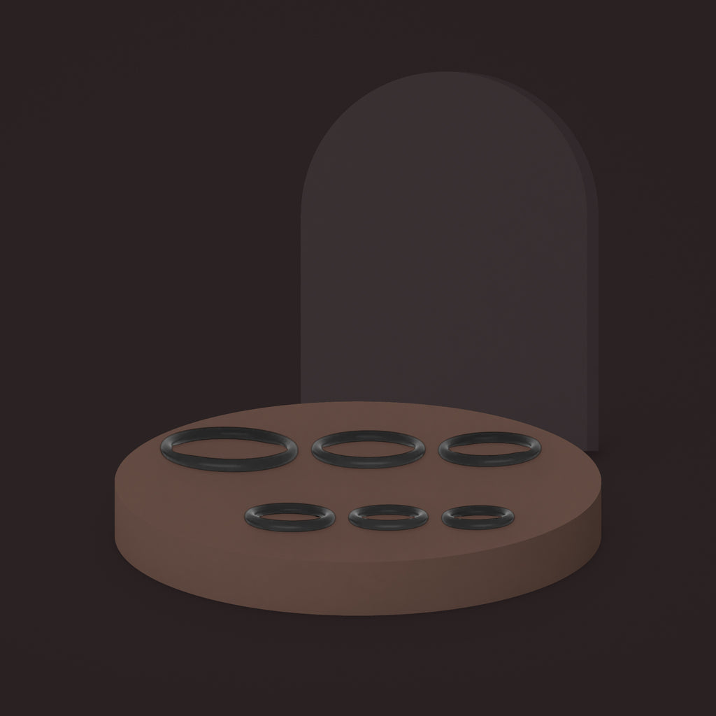 Linnet, silicone ring set in six sizes, on a ceramic plinth (Black)