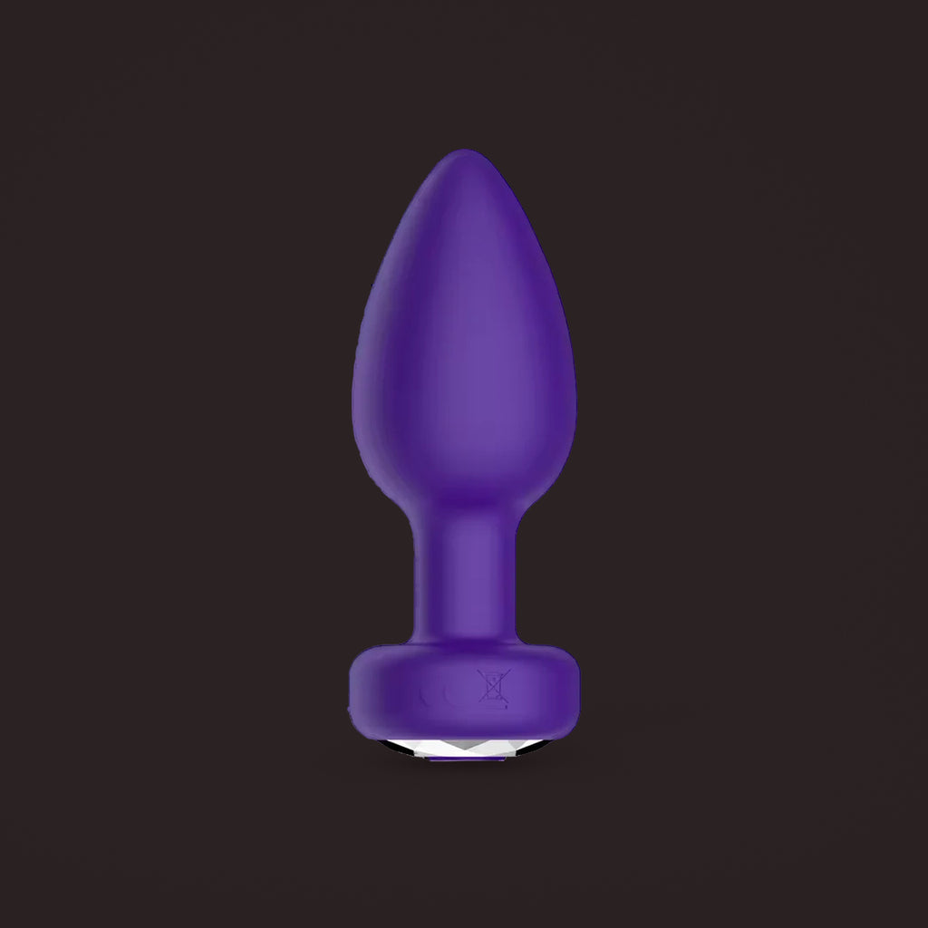 Magpie, app-controlled vibrating jewel plug, front view (Purple)
