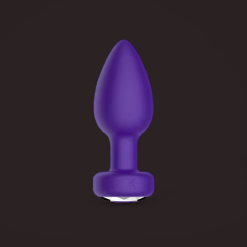 Magpie, app-controlled vibrating jewel plug, front view (Purple)