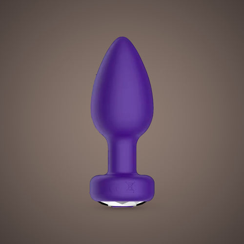 Magpie, app-controlled vibrating jewel plug, front view (Purple)