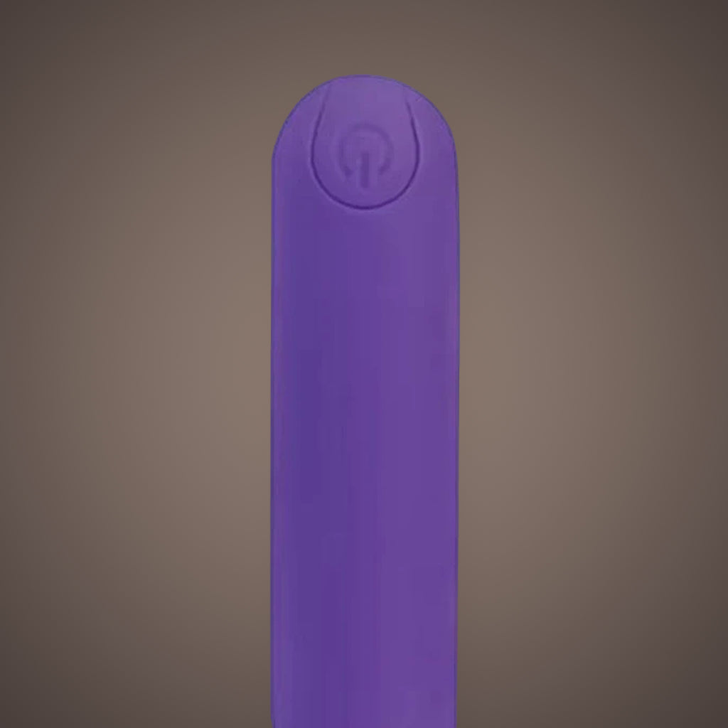 Serin, rechargeable mini bullet vibrator, close-up of the button end (Purple)