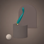 Kea, slim G-spot vibrator with rippled tip, on a ceramic plinth (Green)
